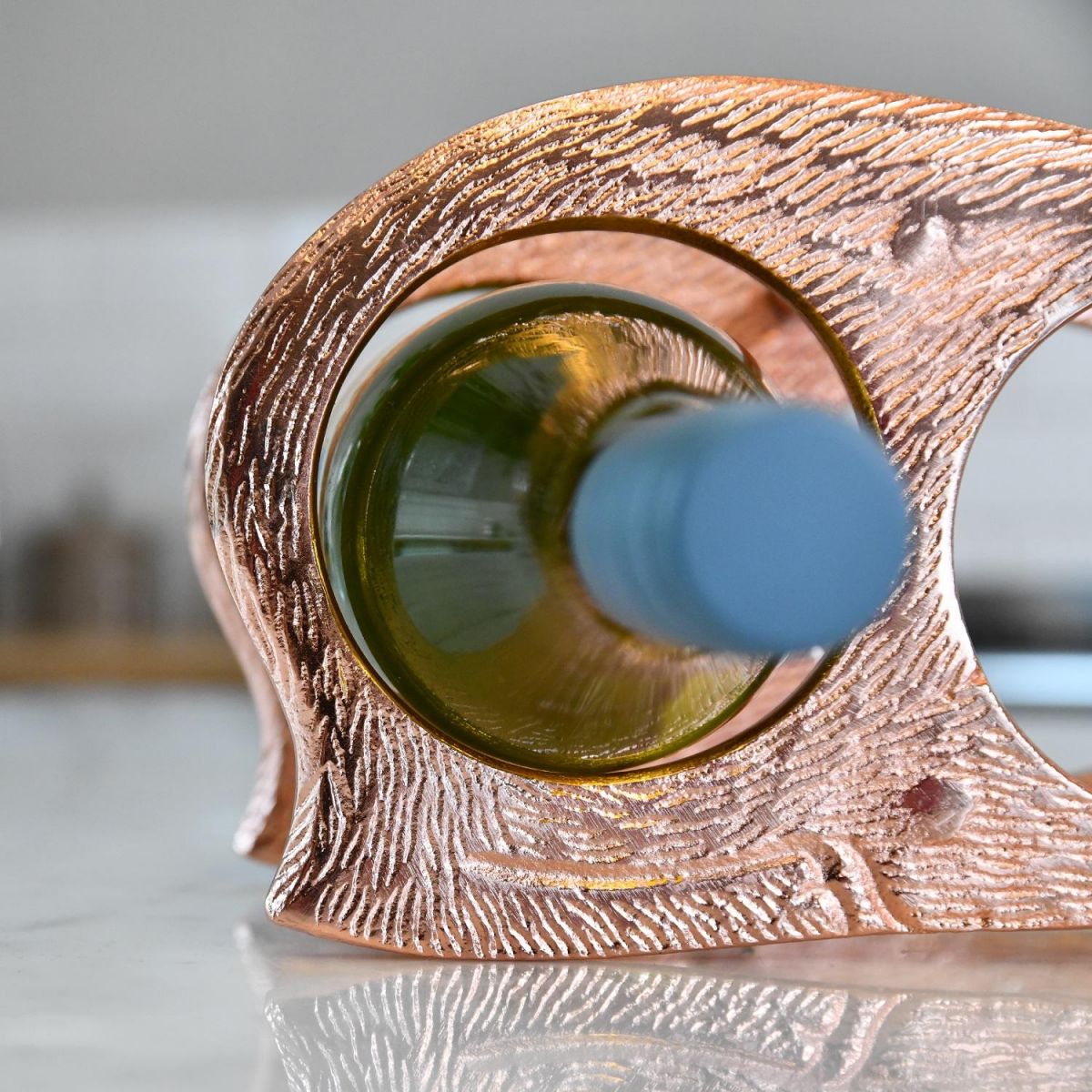 Close up of wine bottle holder on "Laying Stag" 