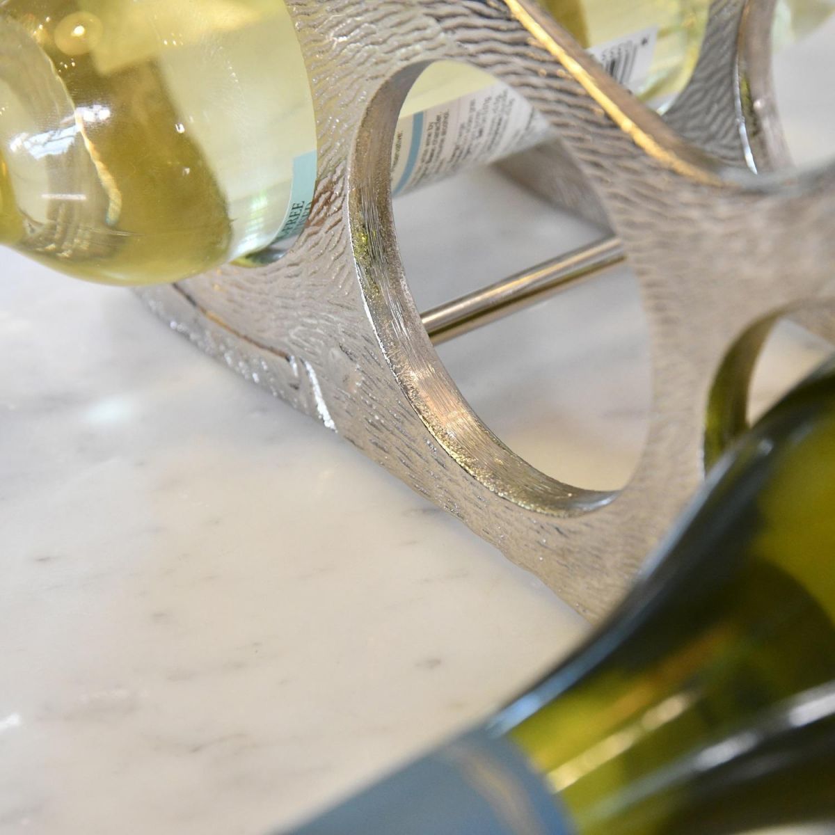 Close up of "Laying Stag" Wine Rack frame with circular bottle holder 