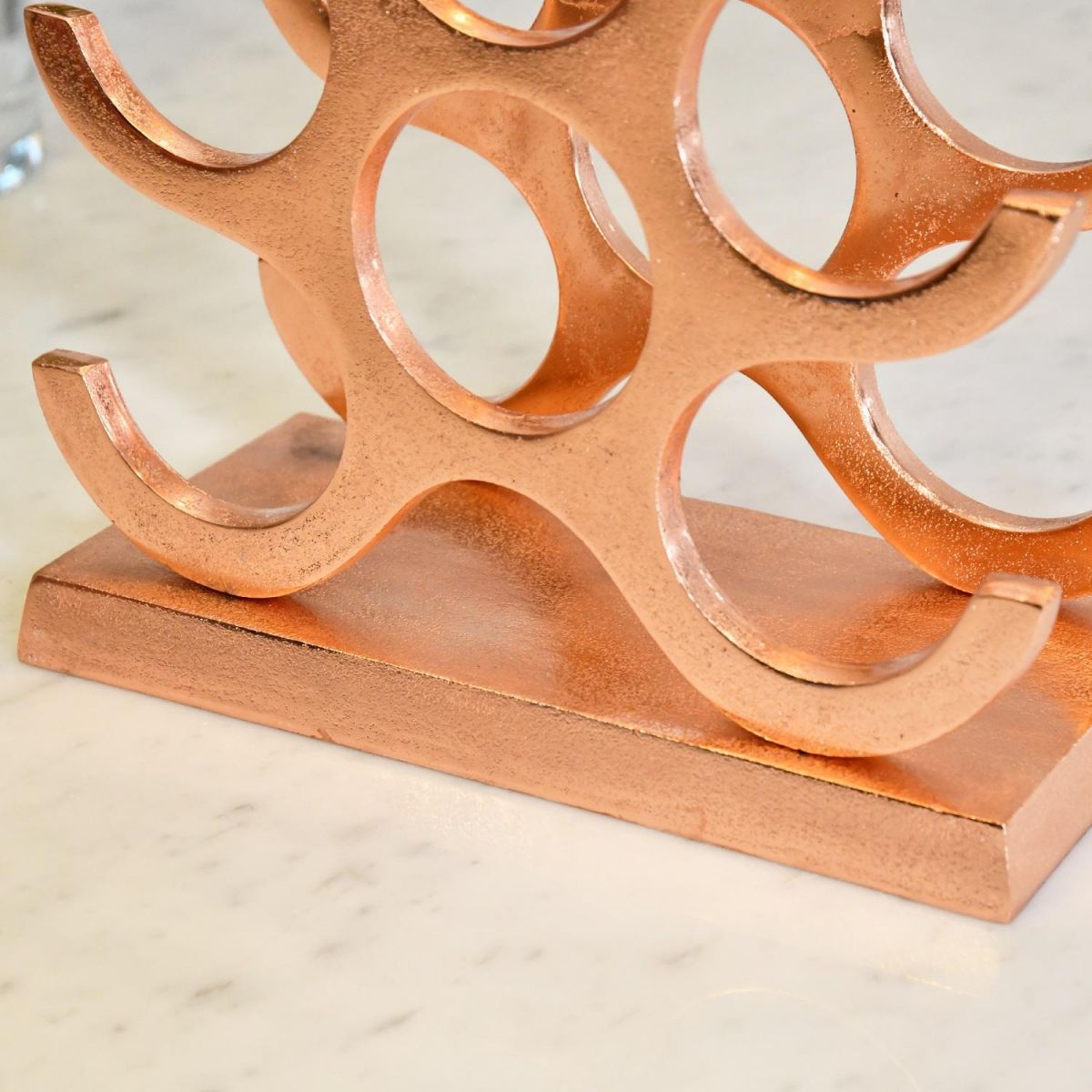 Close up of rectangular base on "Branches" Wine Rack 