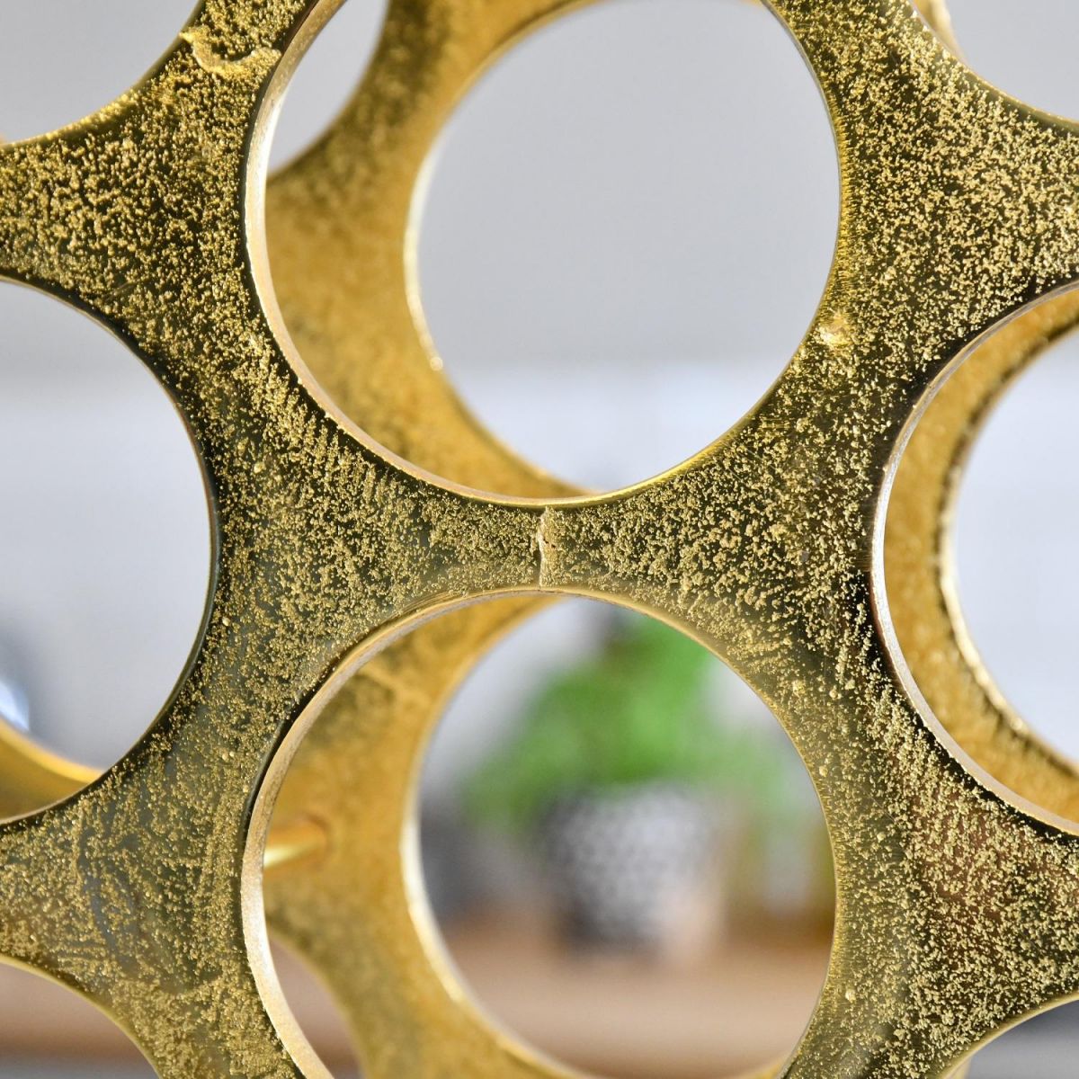 Close up of Bottle Holder in Gold Finish