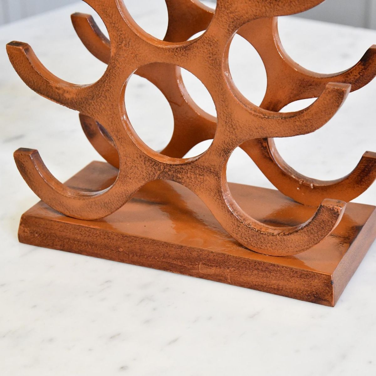 Close up of rectangular base on Wine Rack