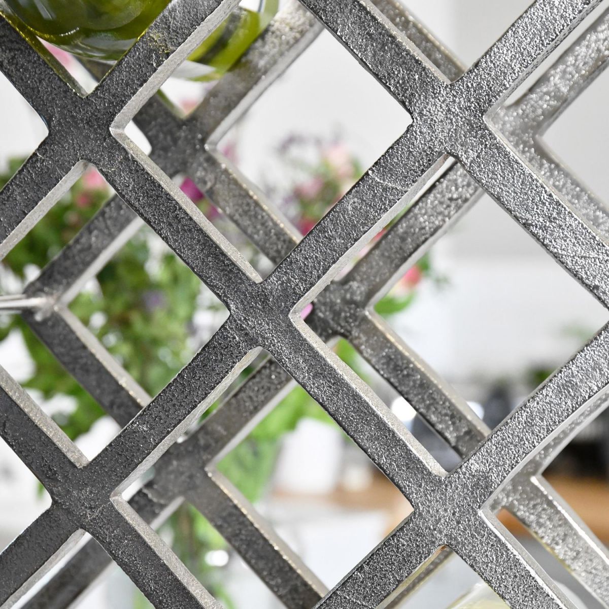 Close up of Polished Nickel finish with Geometric Grid design 