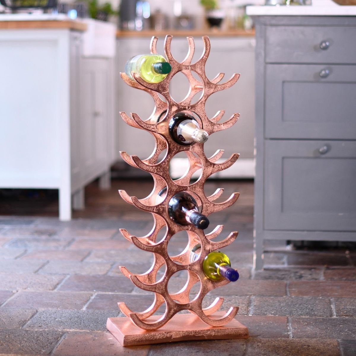 Copper 21 Bottle "Tree" Wine Rack in Kitchen Setting 