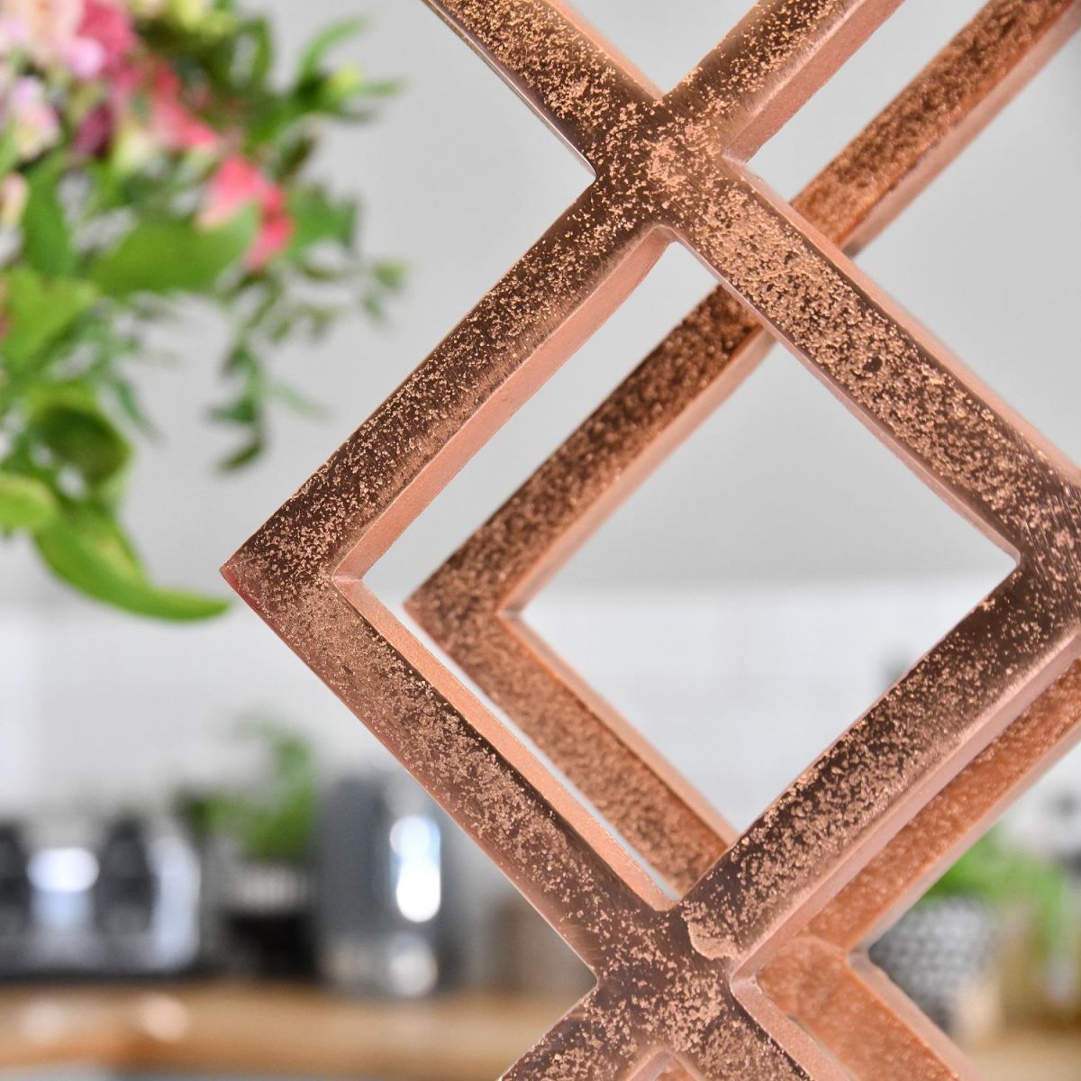 Close up of Copper "Geometric" Wine Rack 