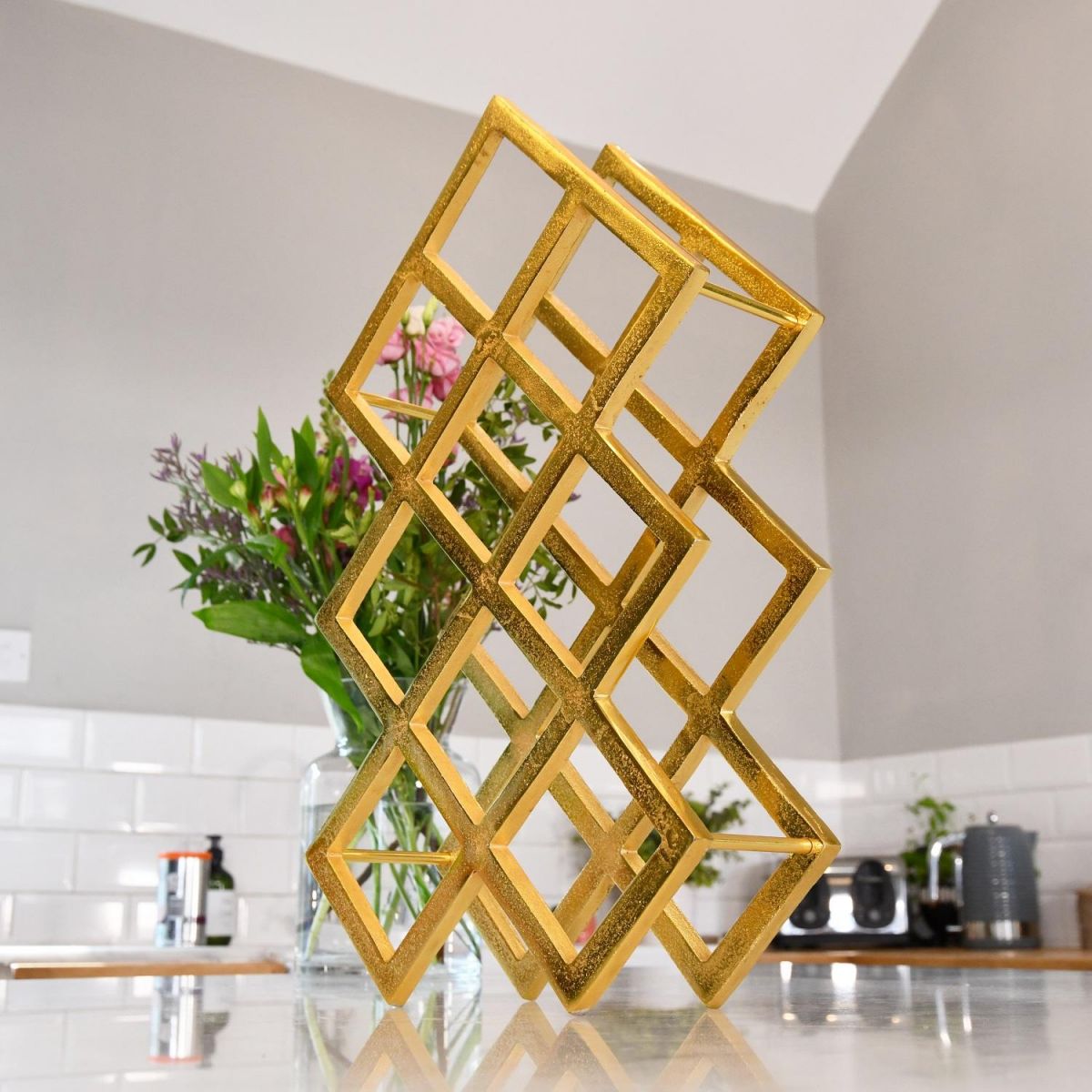 Gold Geometric Wine Rack on Kitchen Countertop 