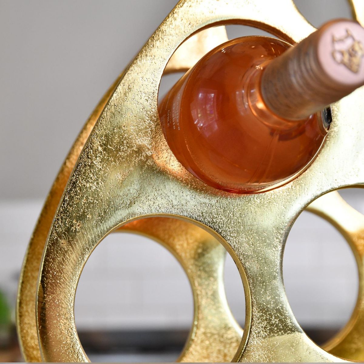 Close up of wine bottle in wine rack 