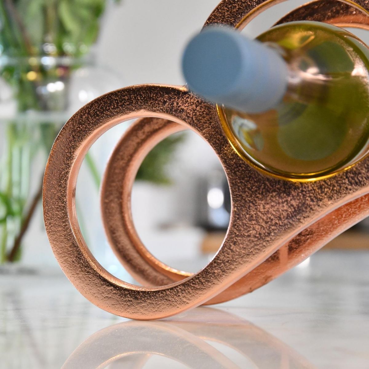 Close up circular bottle holder with wine bottle 