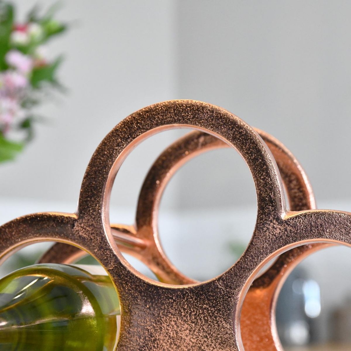 Close up of circular holder on Wine Rack 