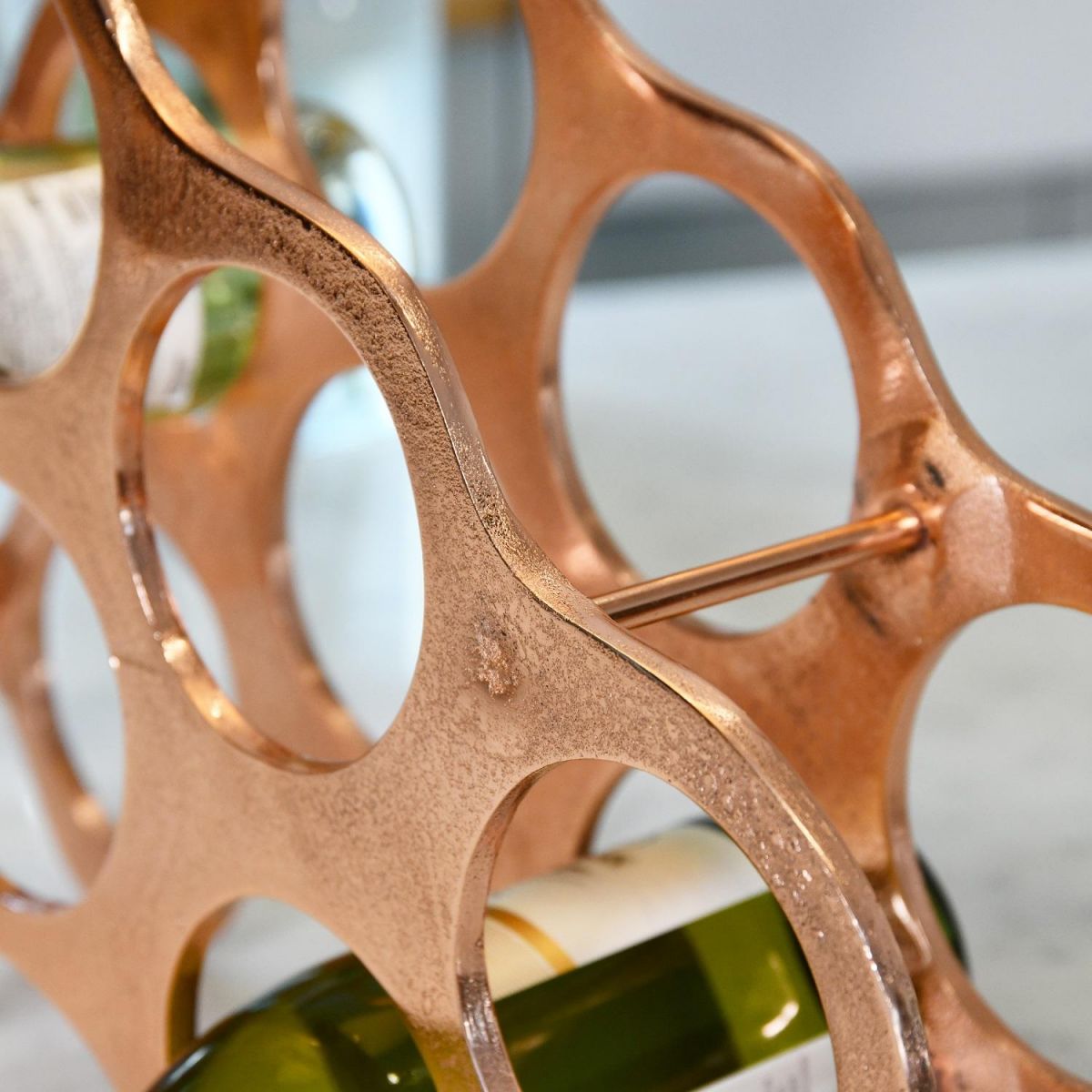 Close up of copper finish on "Cloud" Wine Rack 