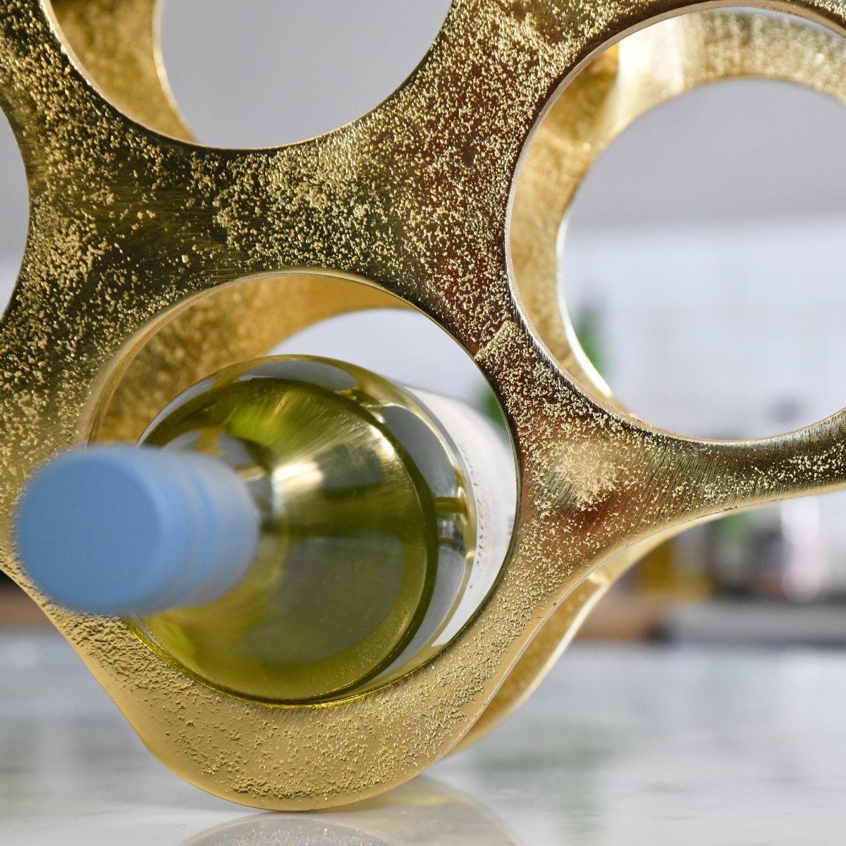 Close up of circular bottle holders in situ 