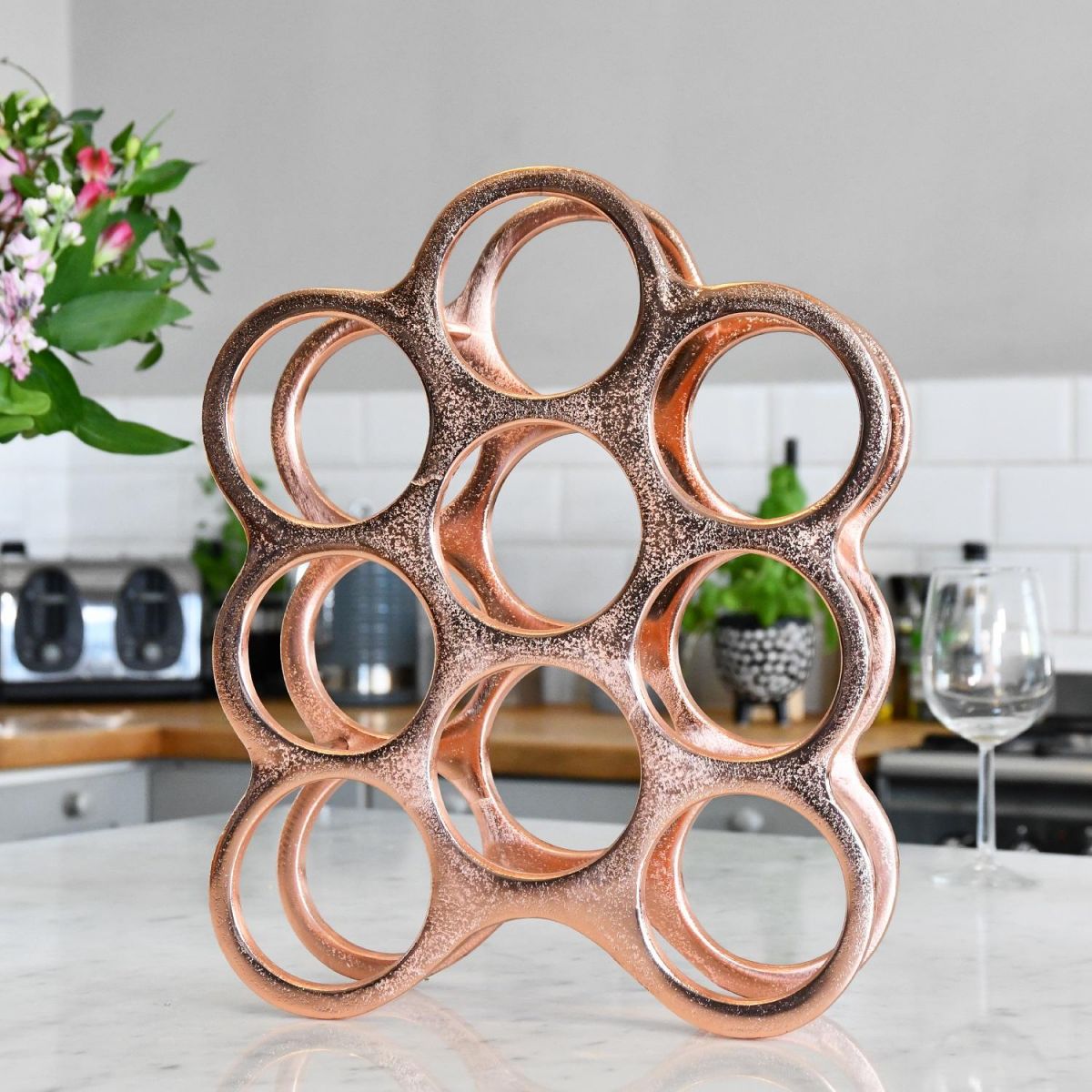 Copper "Floating Bubbles" Wine Rack in Kitchen Setting 