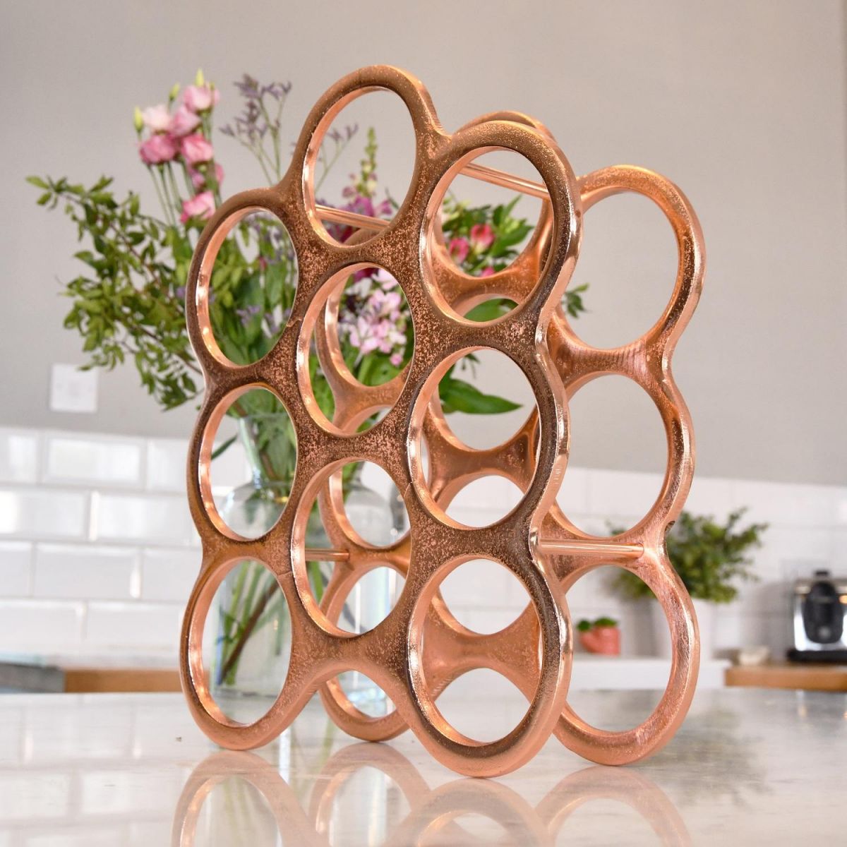 Side view of Copper "Floating Bubbles" Wine Rack in Kitchen 