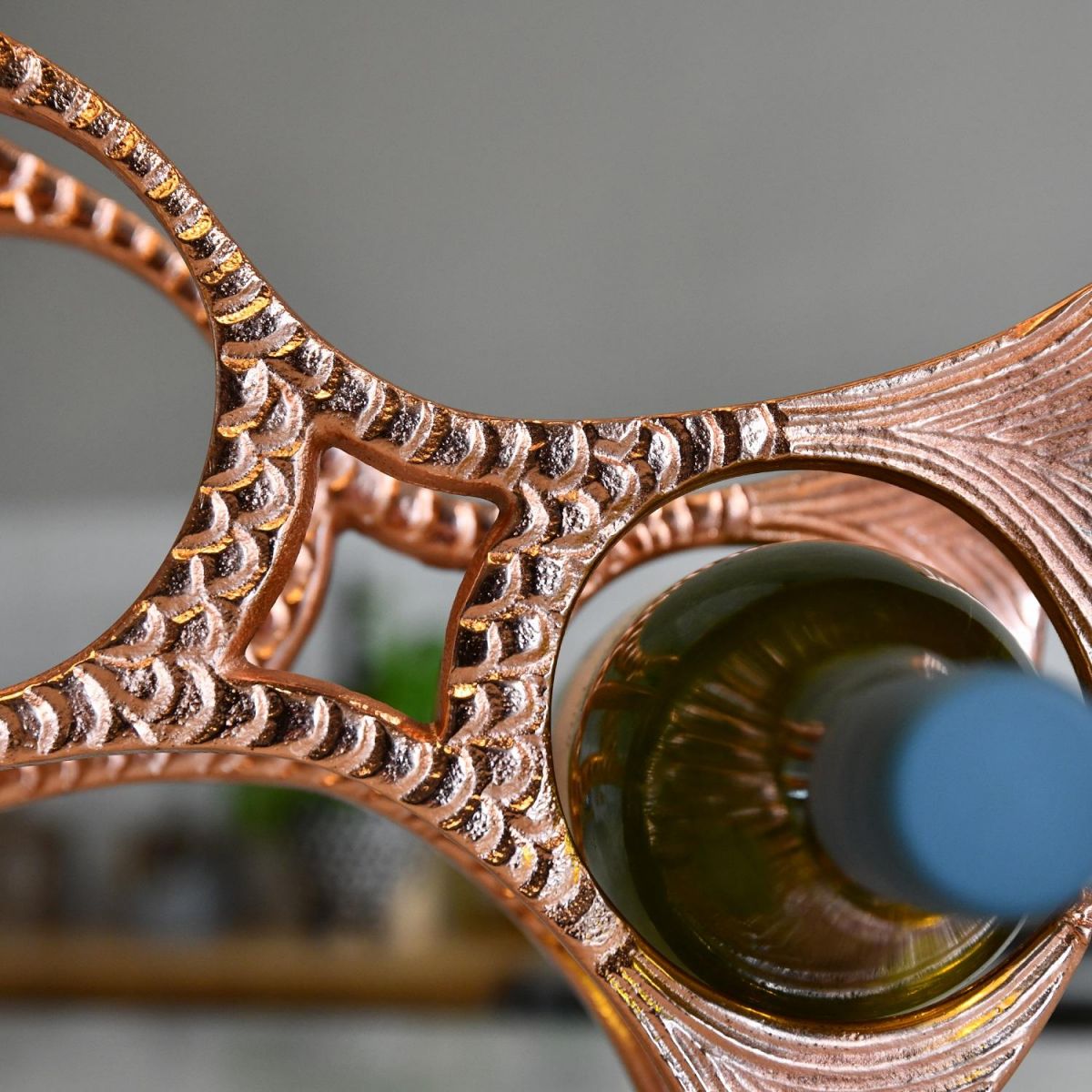 Close up of detailing in Copper "Fish" Wine Rack