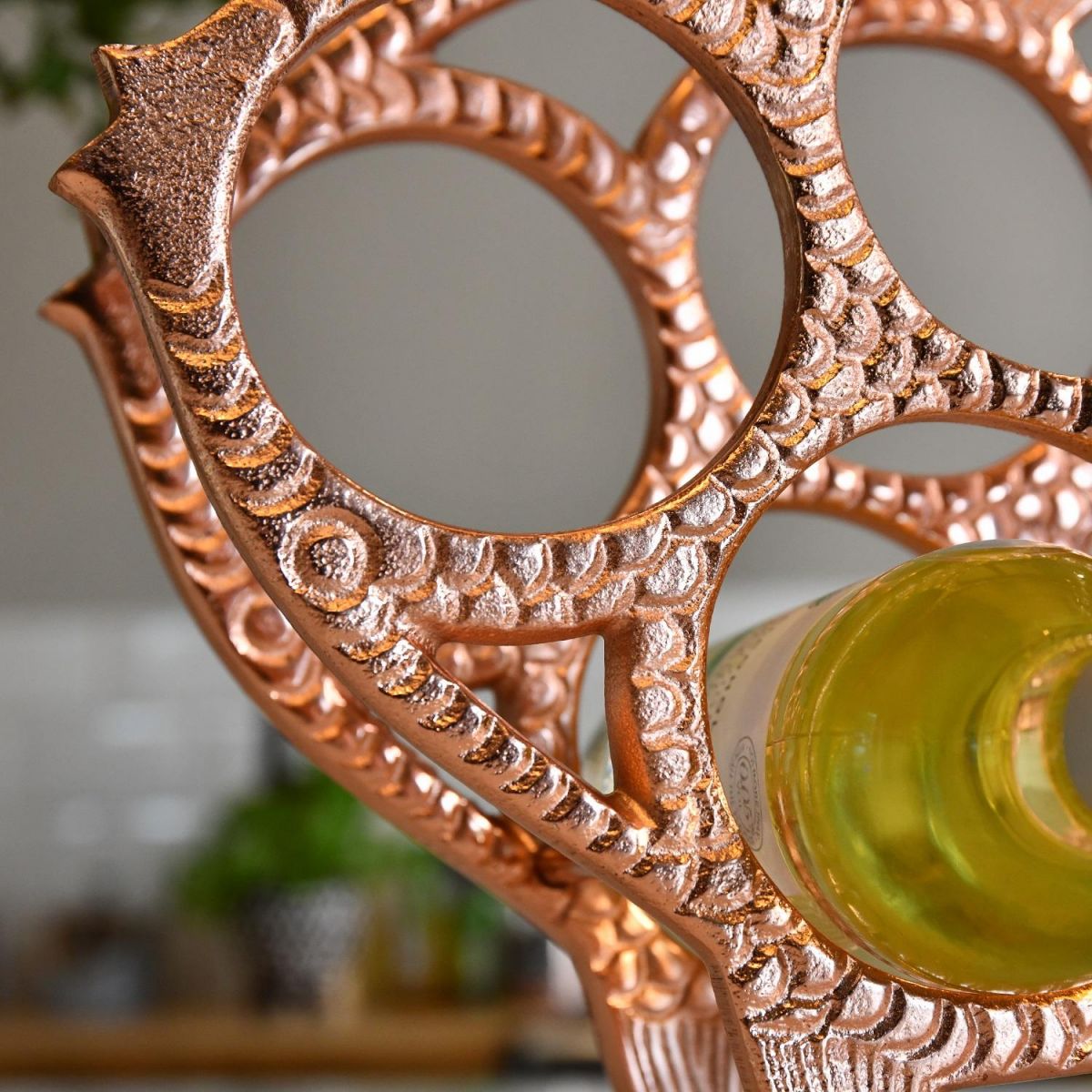 Close up of detailing in "Fish" Copper Wine Rack 