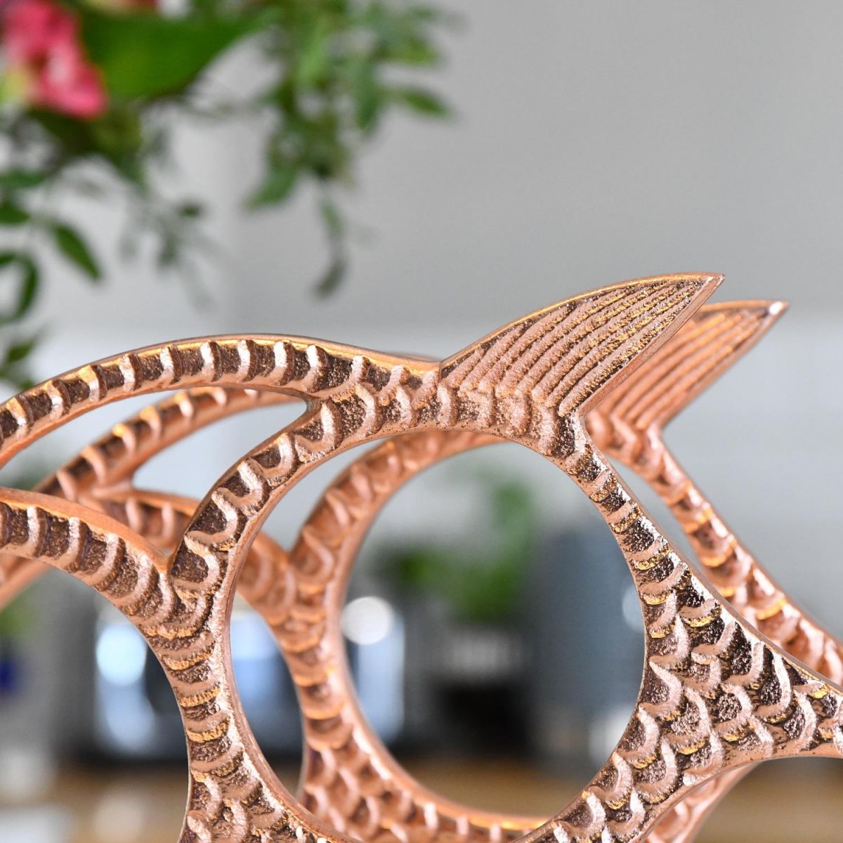 Close up of fin design on Copper "Fish" Wine Rack 