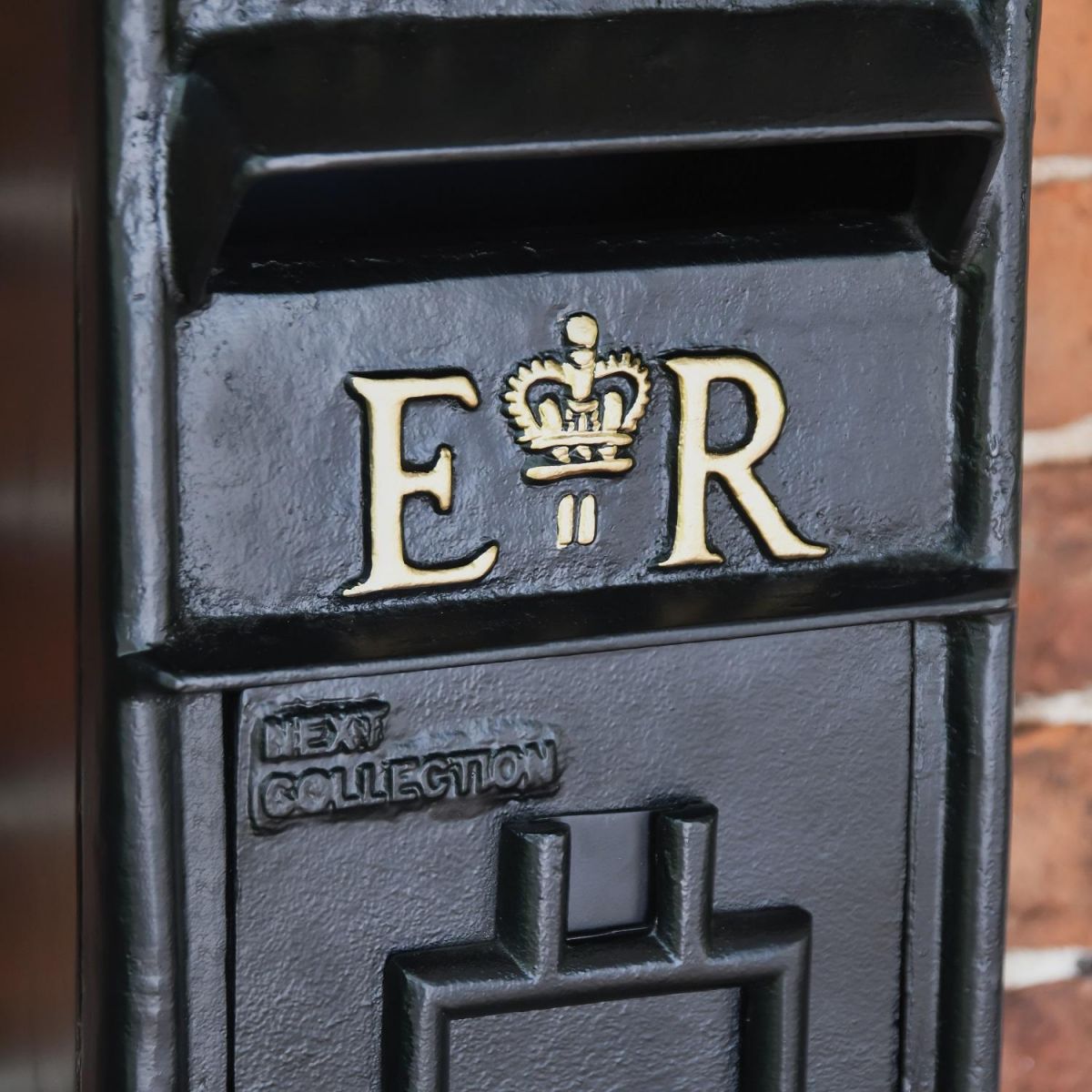 Close up of Hand Painted Gold Lettering and Motif 