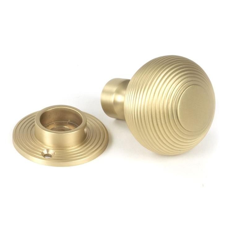 Situ Shot of Satin Brass "Beehive" Mortice & Rim Doorknob Set