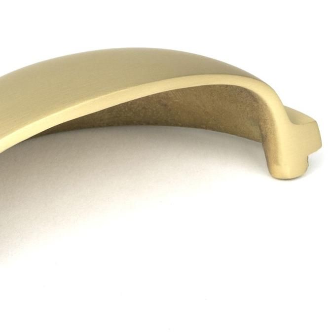 Close-Up of Satin Brass Concealed Drawer Pull - 85mm x 40mm