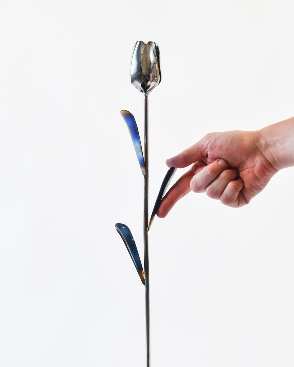 Scale image of floral scrap metal art sculpture Scale image of floral scrap metal art sculpture