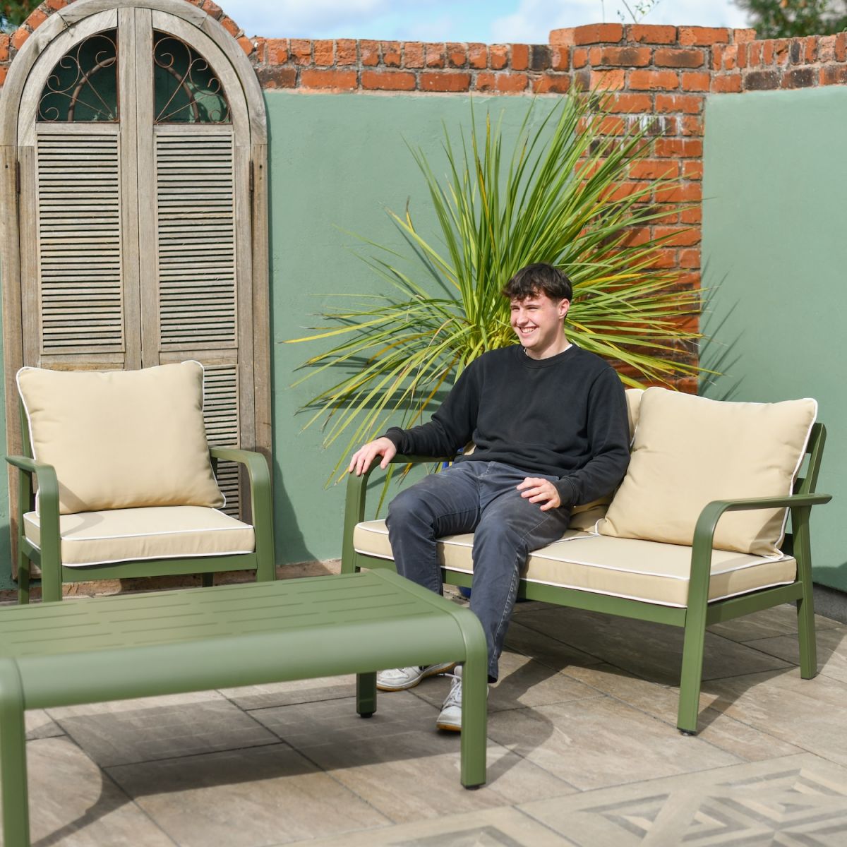 Scale image of green five seater garden lounge furniture set