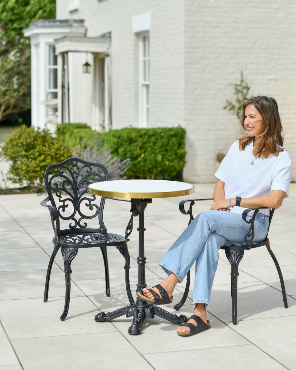 Scale image of black two seater bistro set with marble effect tabletop