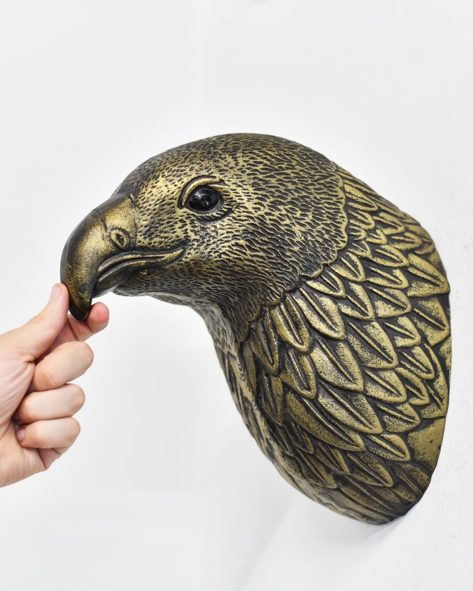 Scale image of eagle head wall bust