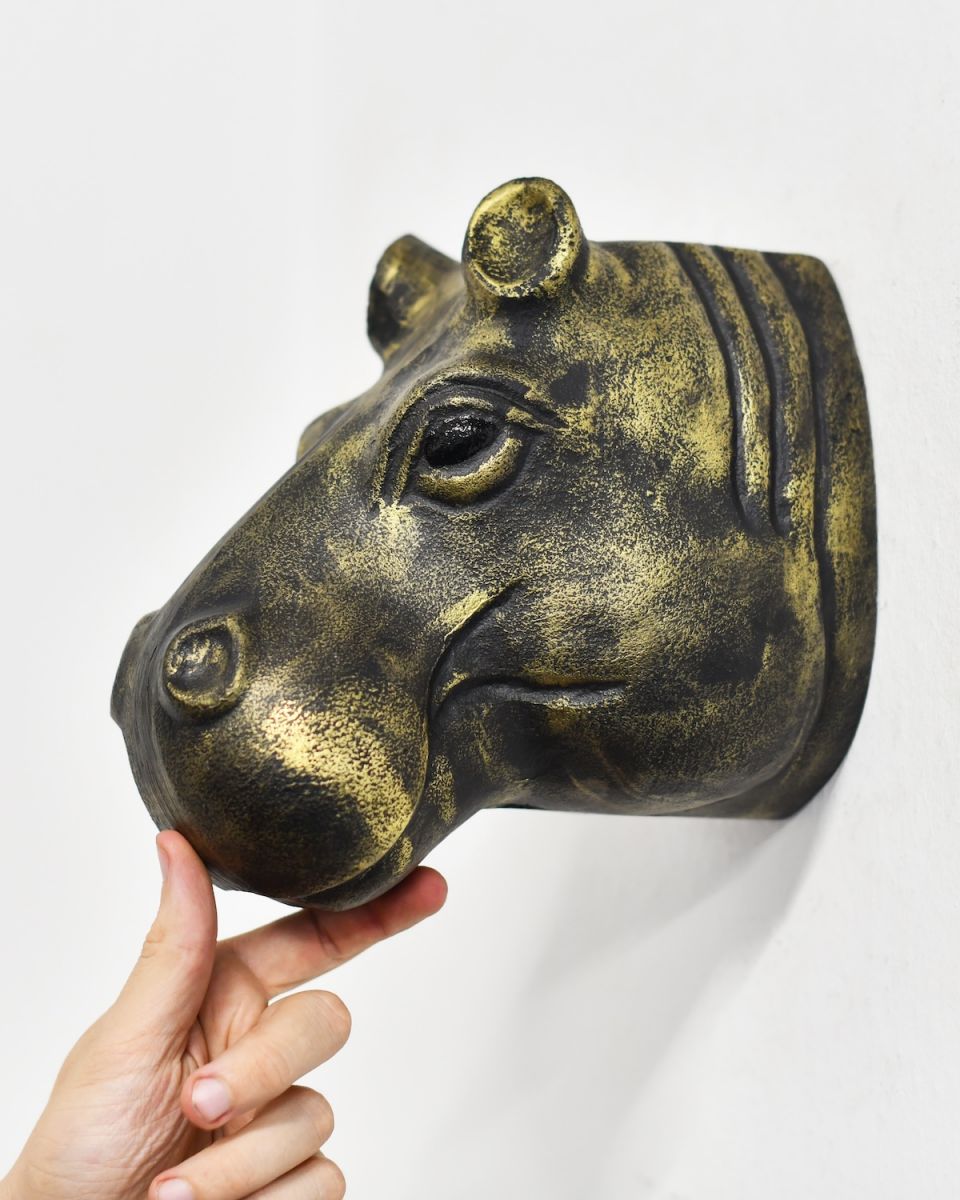 Scale image of gold safari animal wall bust
