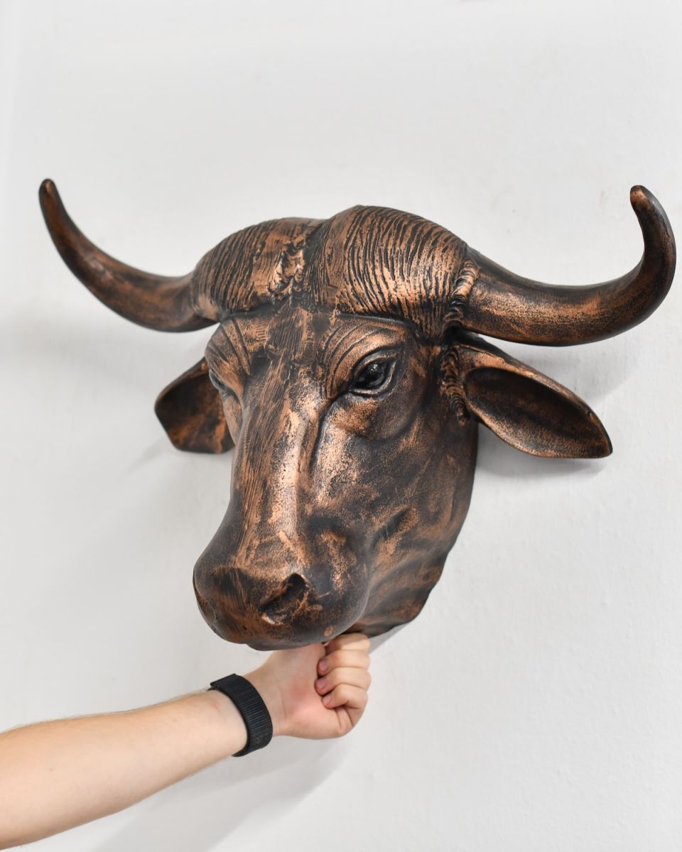 Scale image of copper animal head wall bust