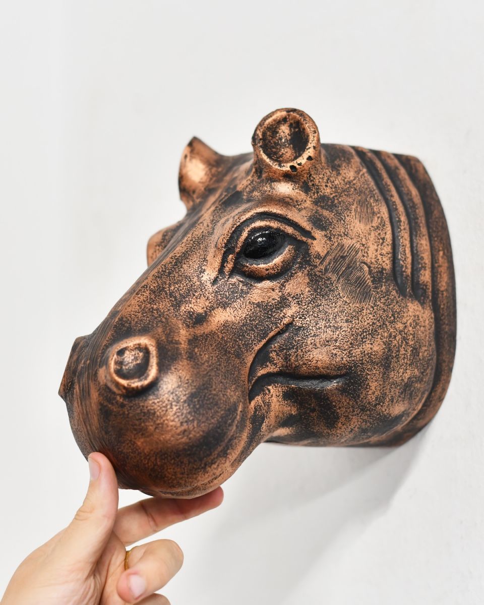 Scale image of animal head wall bust