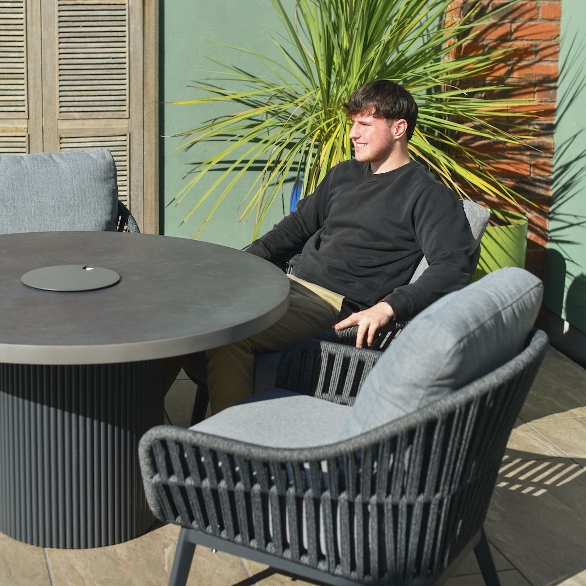 Scale image of grey rope weave four seater garden furniture set