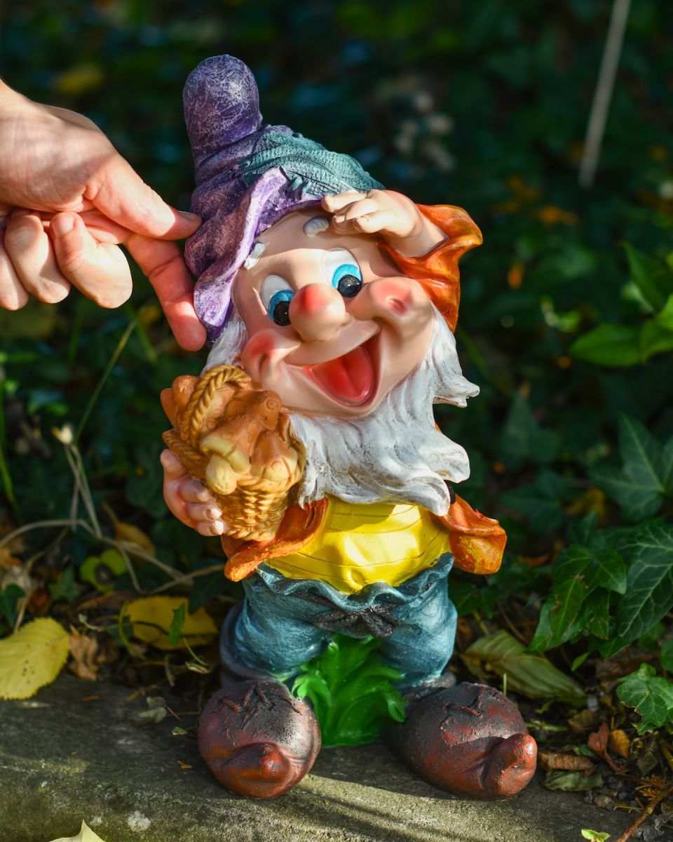 Scale image of colourful garden gnome sculpture