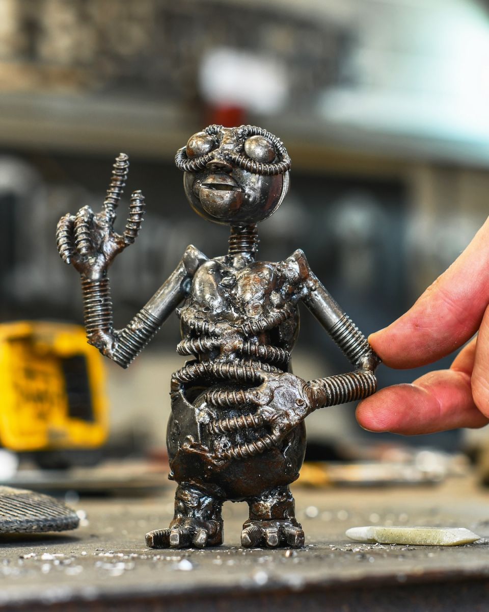 Scale image of recycled metal home decor sculpture Scale image of recycled metal home decor sculpture