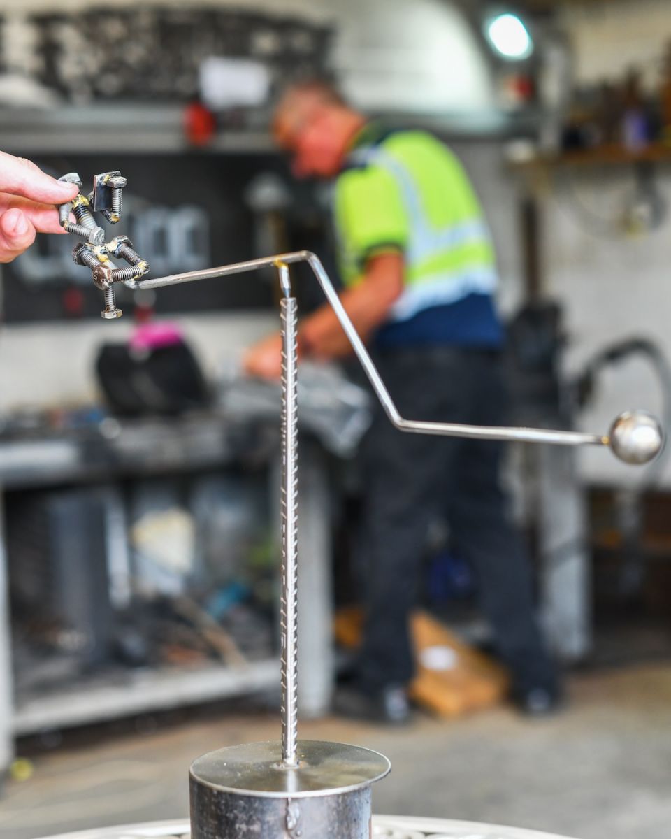 Scale image of Recycled Metal "Reader at Rest" Art Sculpture Scale image of Recycled Metal "Reader at Rest" Art Sculpture