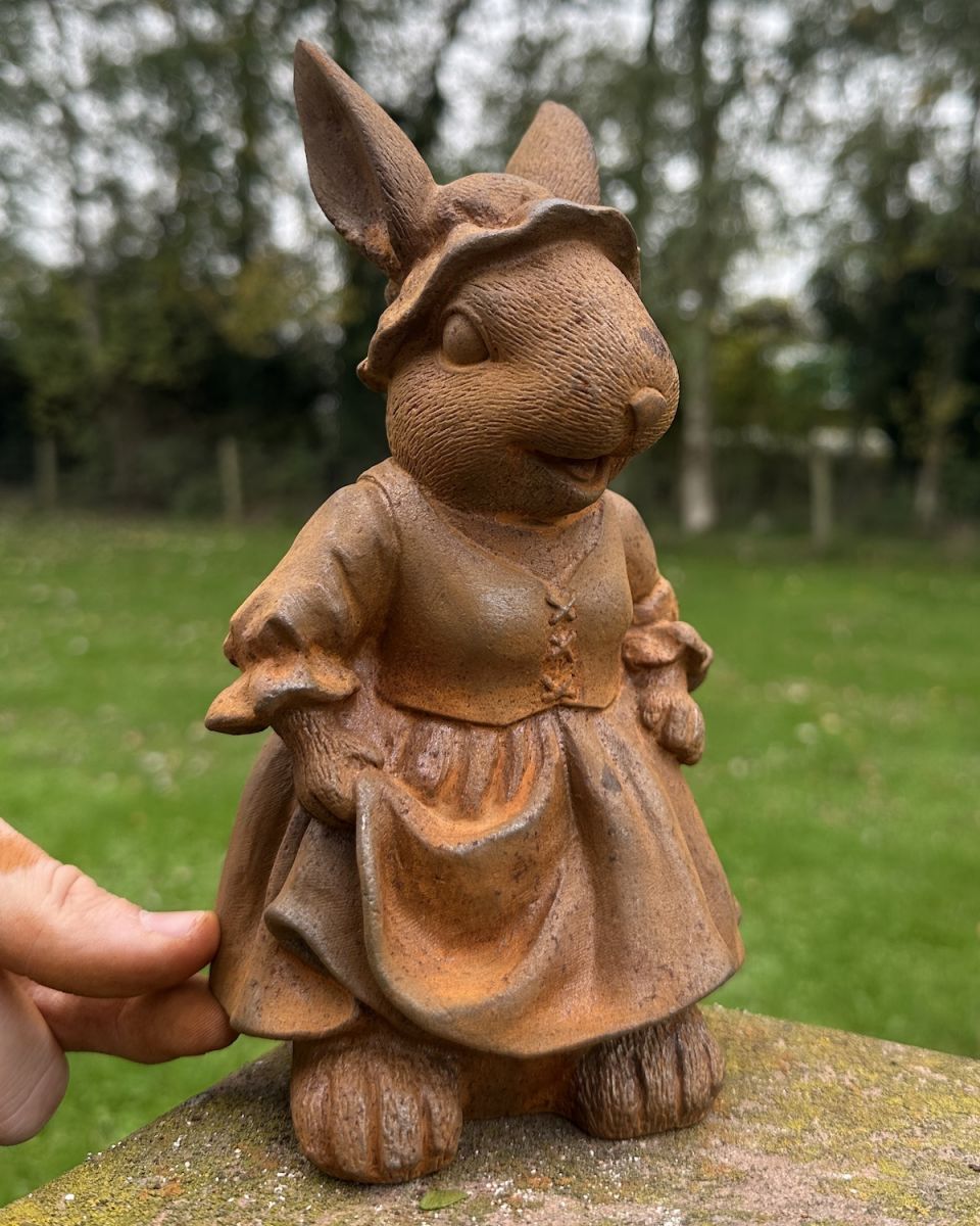 Scale image of dressed up rabbit outdoor statue