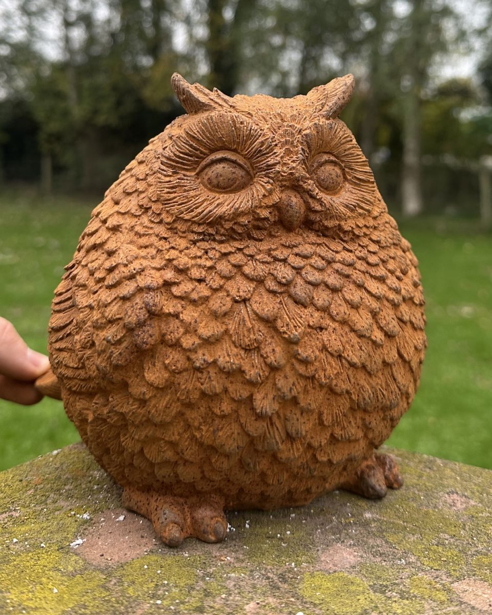 Scale image of cast iron owl outdoor statue