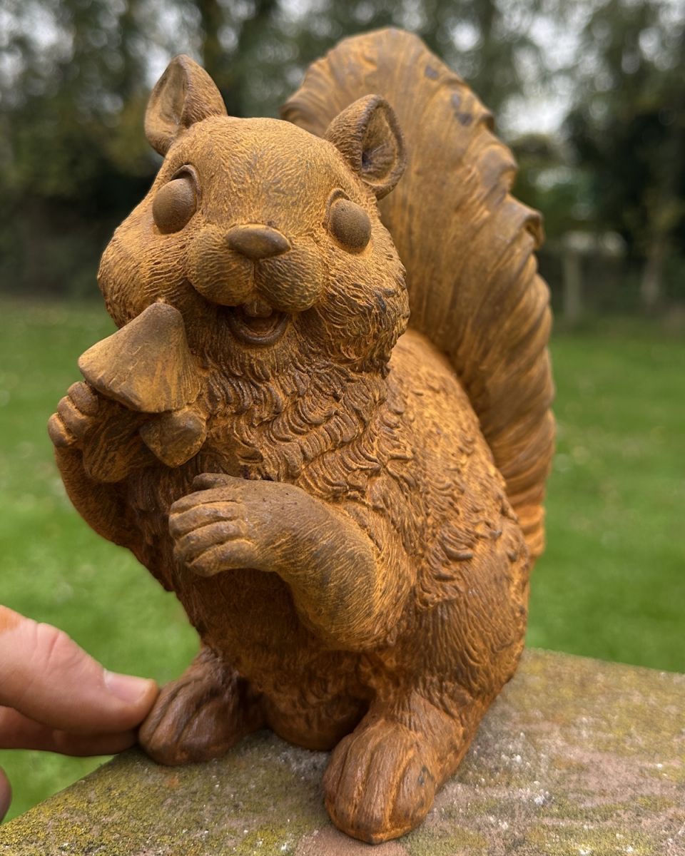 Scale image of Rustic Cast Iron "Chatter" the Squirrel Garden Sculpture