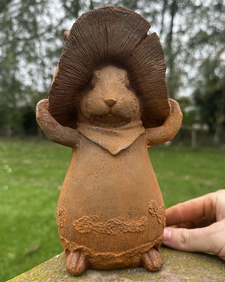 Scale image of rustic cast ironrabbit garden sculpture Scale image of rustic cast ironrabbit garden sculpture