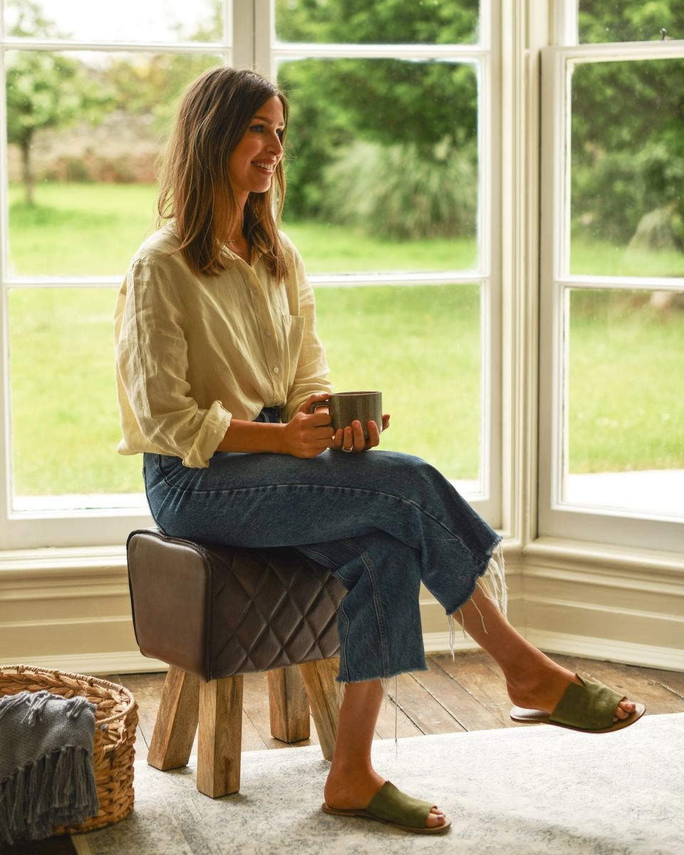 Scale image of brown leather stool