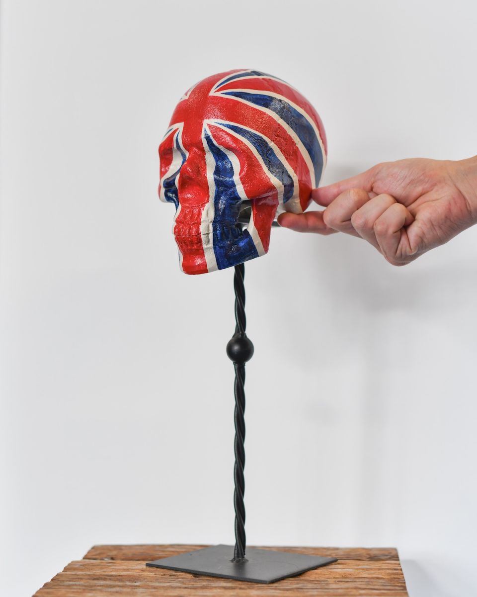 Scale image of handpainted freestanding british flag skull home decor ornament