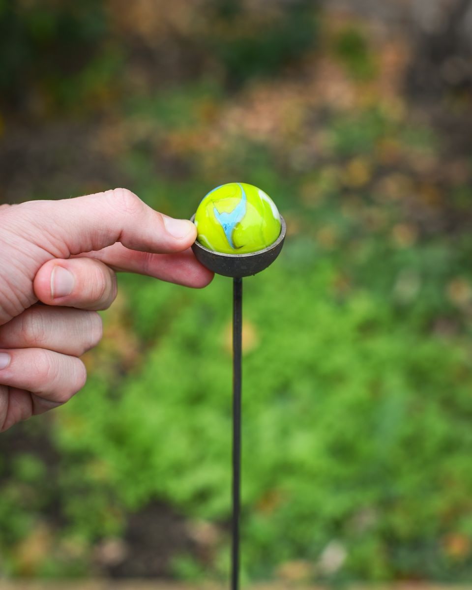 Scale image of lime green suncatcher garden ornament