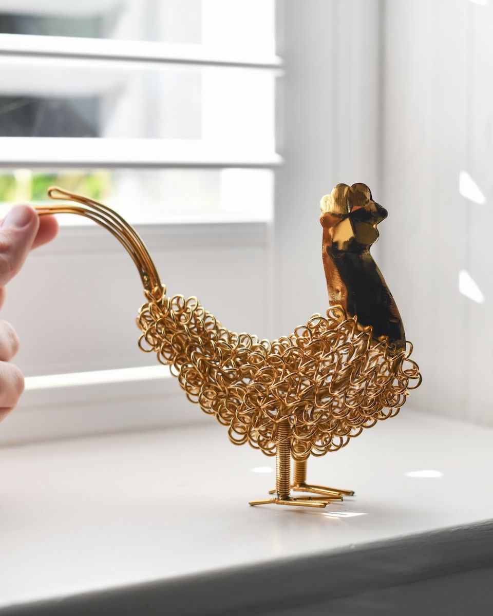 Scale image of recycled cockerel sculpture