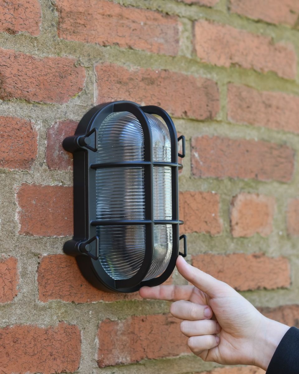 scale photo of nautical wall light