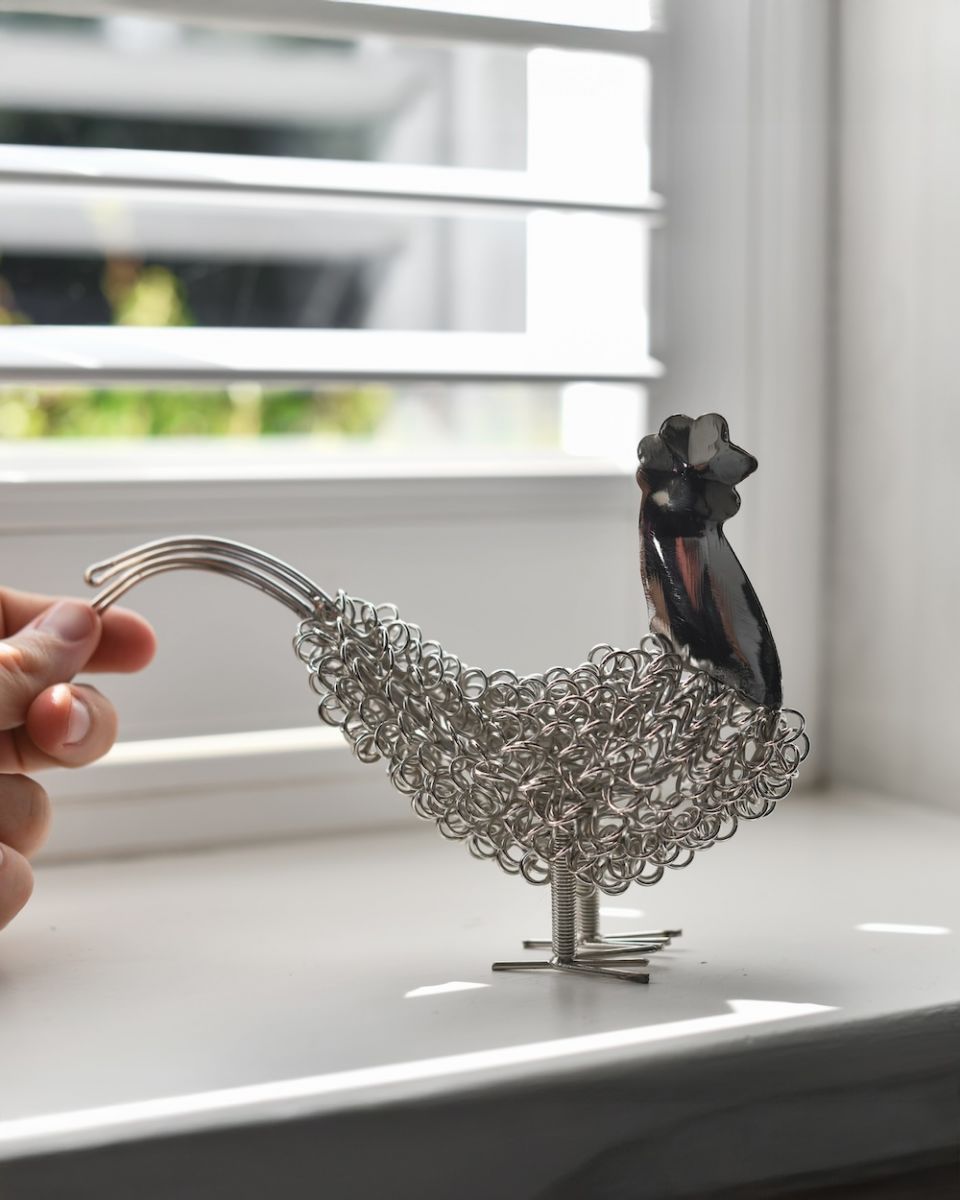 Scale image of recycled cockerel sculpture