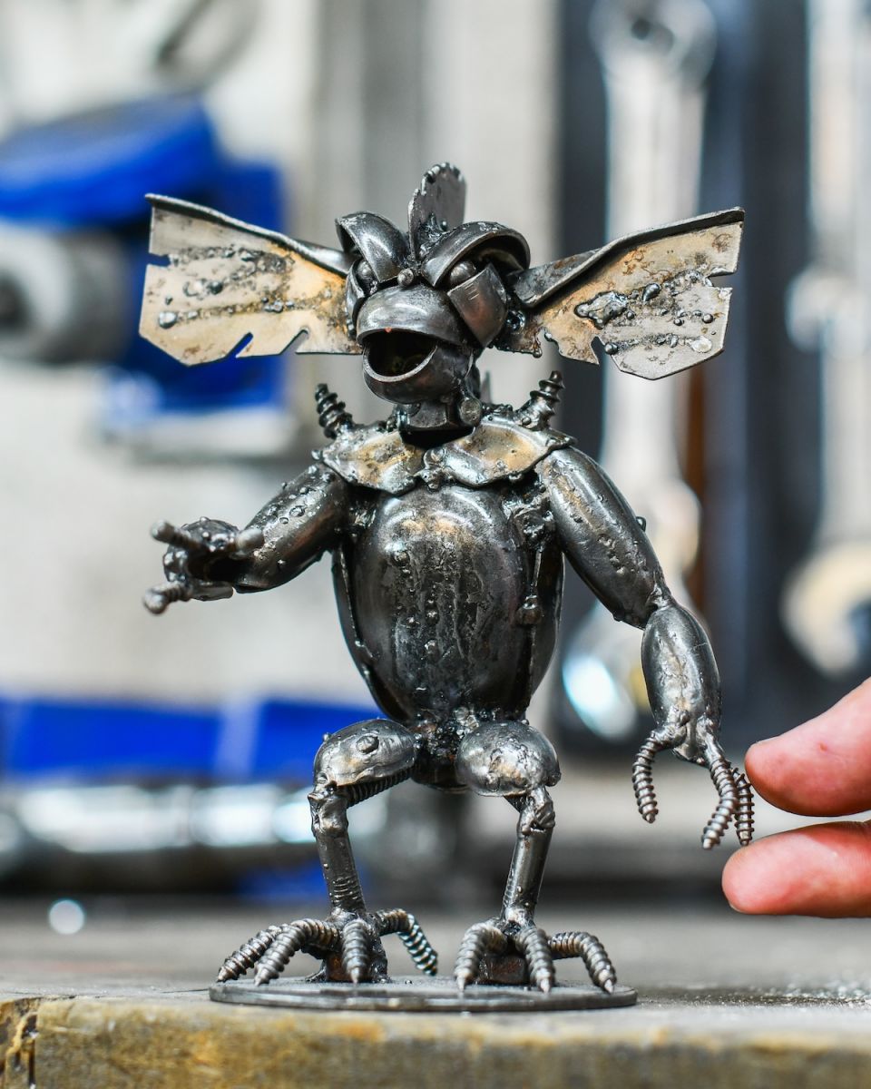 Scale image of scrap metal home decor sculpture