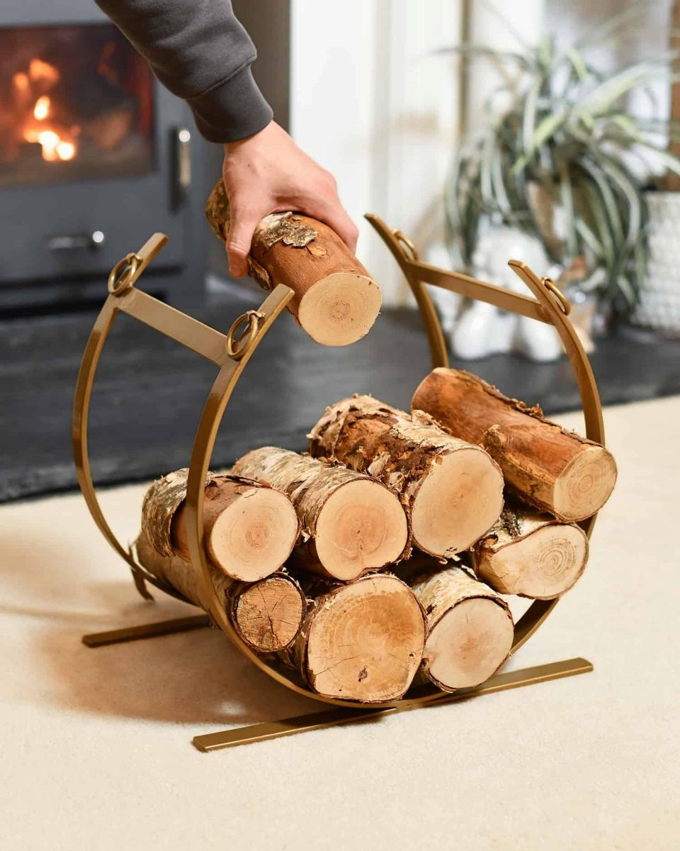 Scale Shot of Blacksmith Brass Finish Curved Log Rack Scale Shot of Blacksmith Brass Finish Curved Log Rack