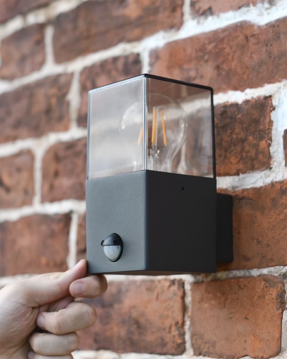 Scale Shot of Contemporary Black "Cube" Wall Light