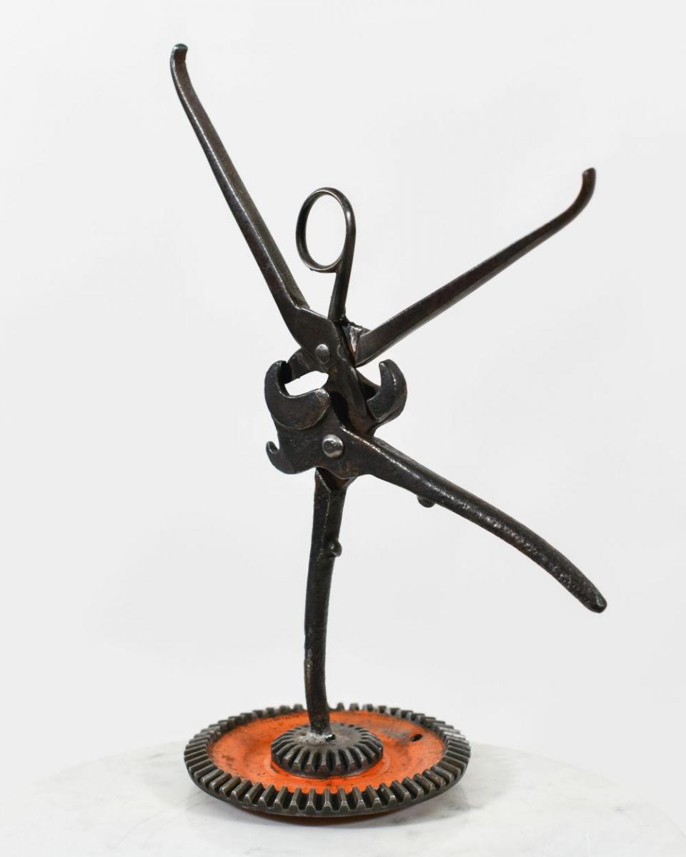 Scrap Metal Ballerina Sculpture side view Scrap Metal Ballerina Sculpture side view