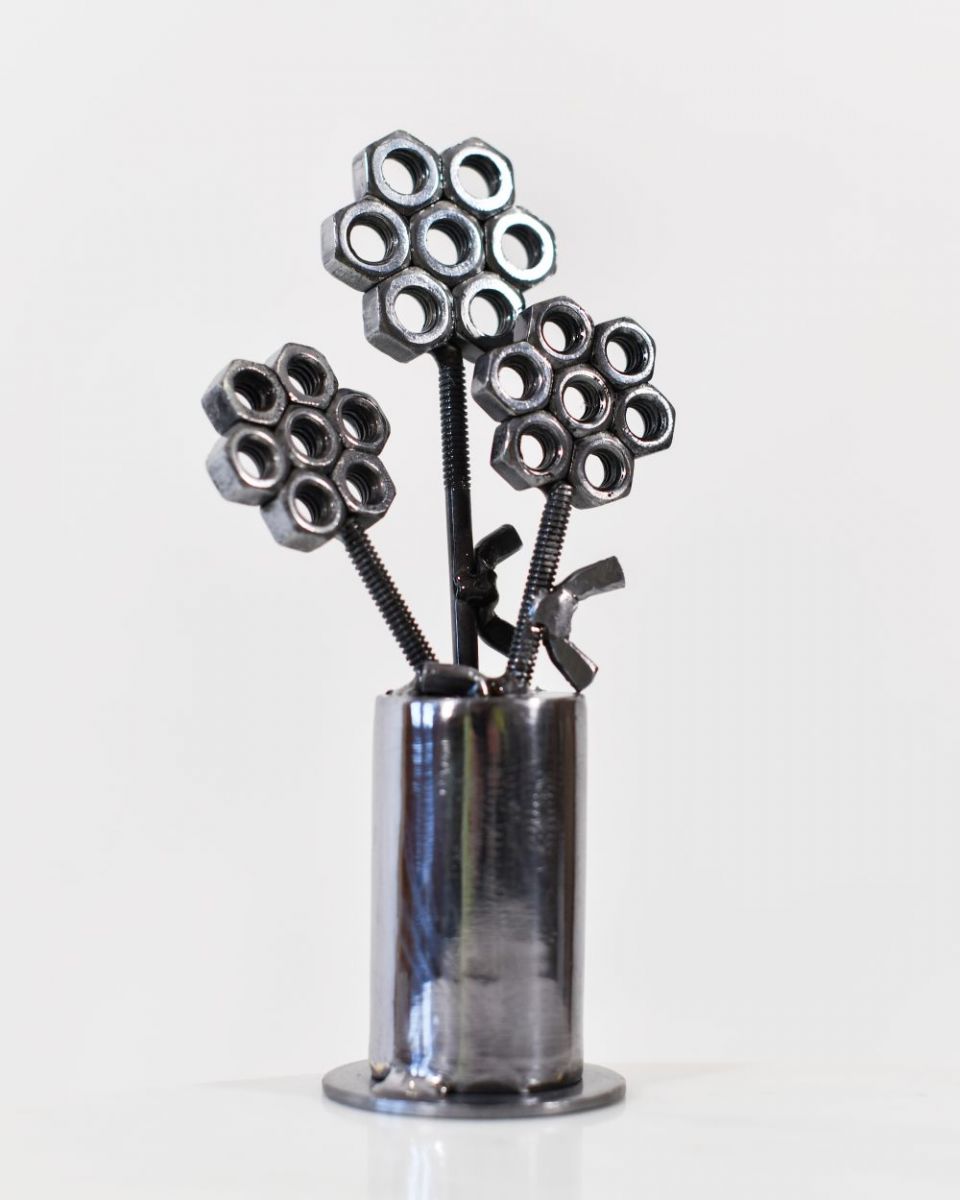 Scrap Metal Flower Pot Sculpture side view Scrap Metal Flower Pot Sculpture side view