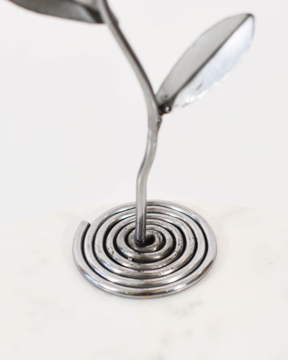 Close up of Scrap Metal Sunflower Sculpture base Close up of Scrap Metal Sunflower Sculpture base