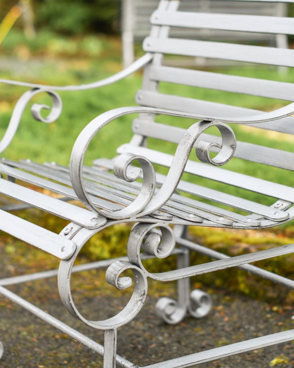 Close Up Of Scrolled Bench Legs 